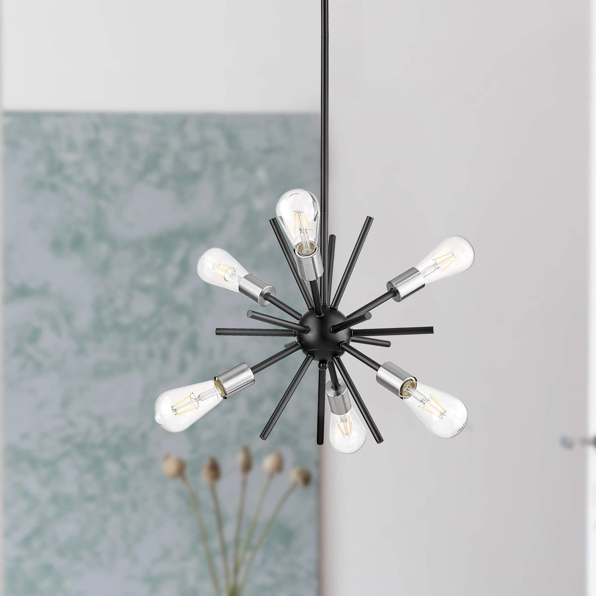 sputnik pendant light hanging in living room