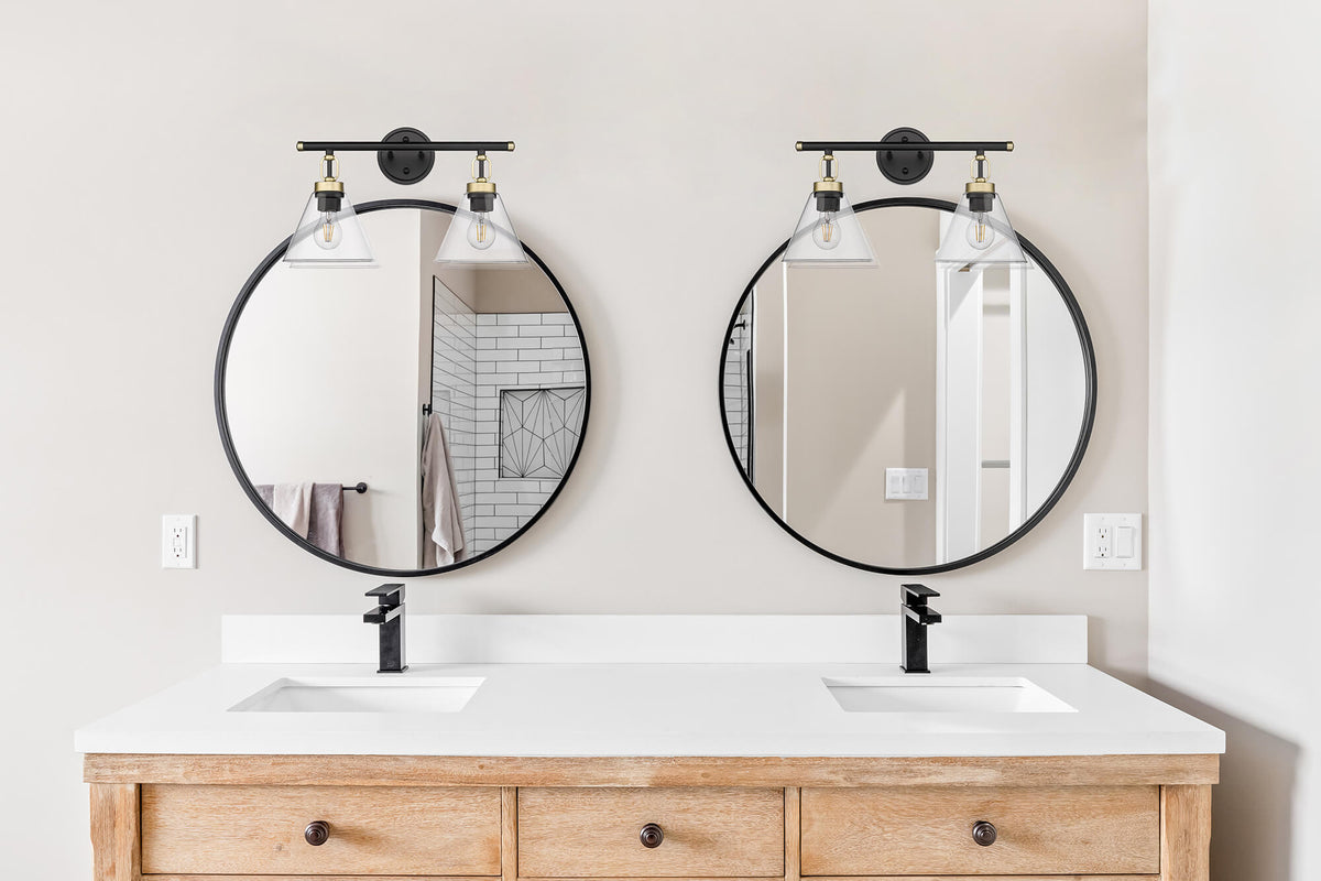 Modern black clear glass vanity light over mirror