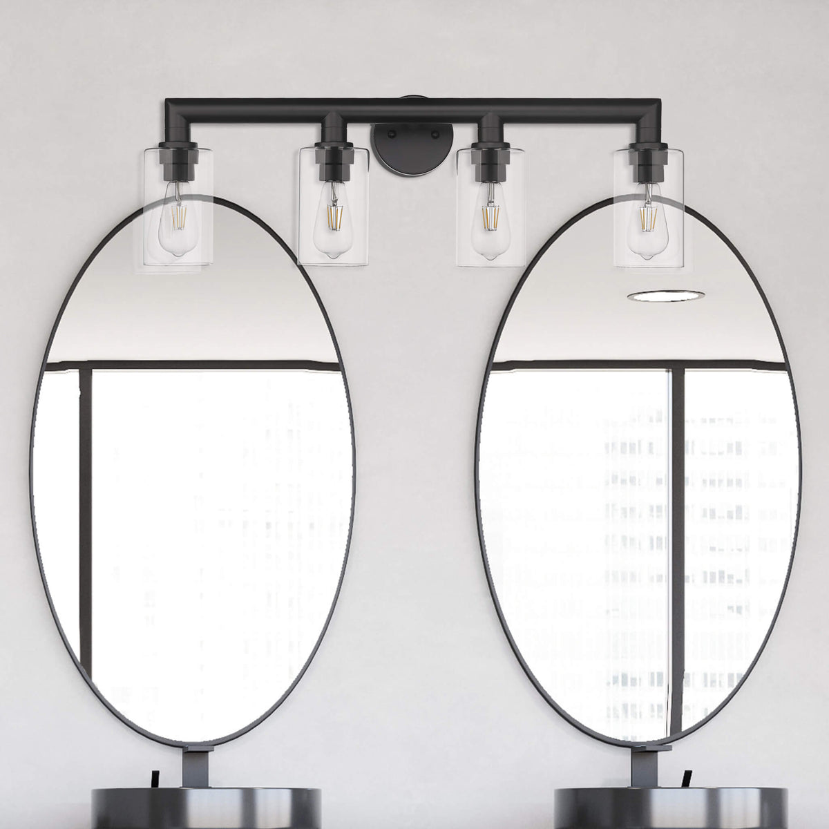 Modern black vanity with 4 lights over mirror