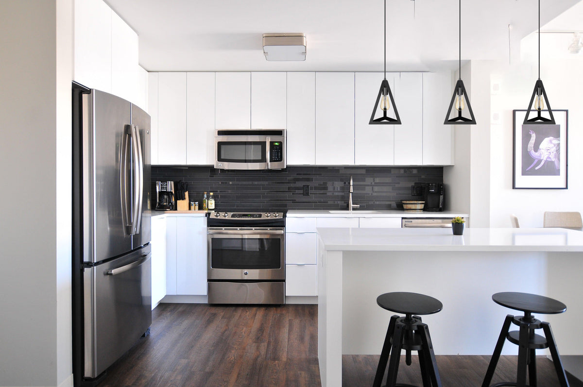 Black modern pendant lighting for kitchen island over table 