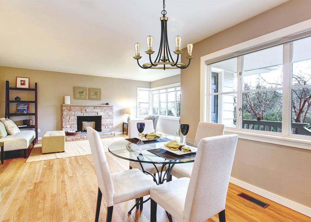 Black and gold pendant light over dining table