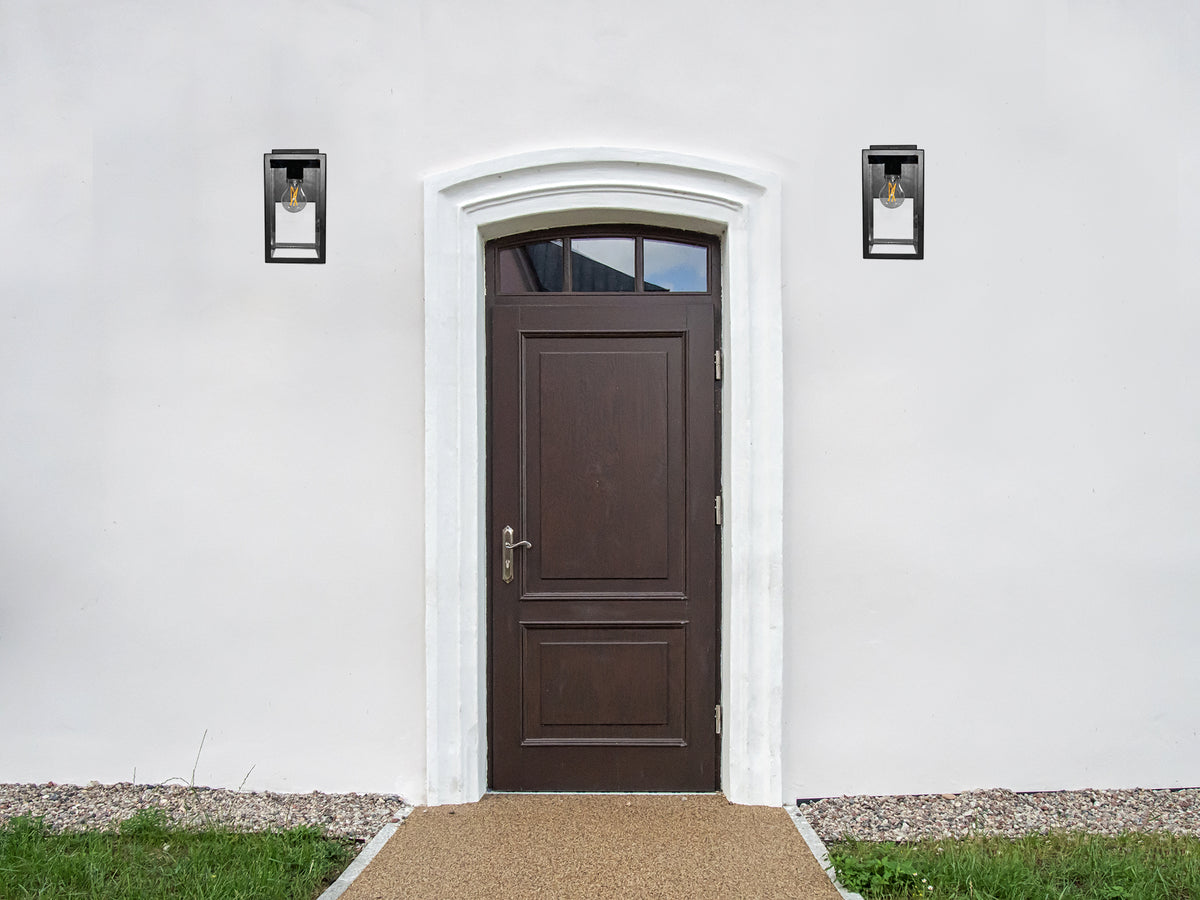 Small black rectangle outdoor wall sconce by front door