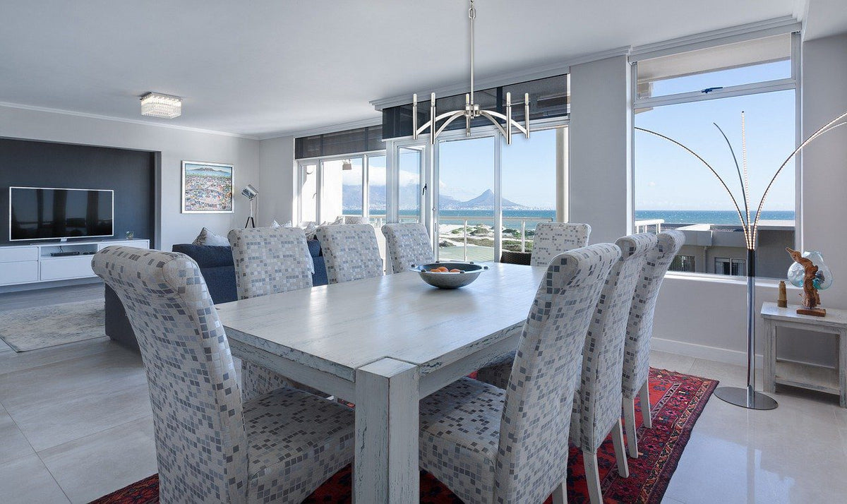 Polished nickel vintage candle chandelier at dining room - Vivio Lighting
